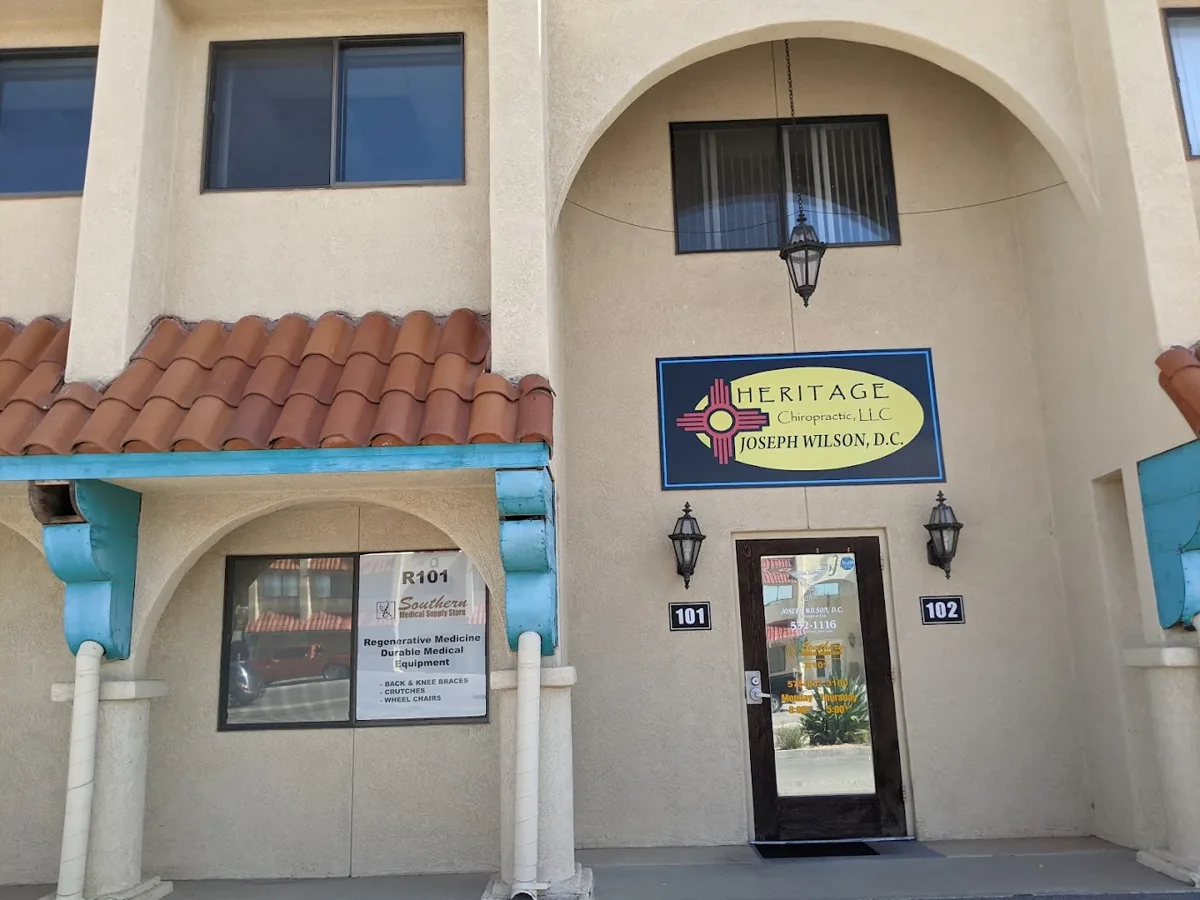 The Heritage Chiropractic, LLC sign above the office door